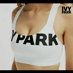 IVY PARK White Sport Bra. Black Front Logo. Crossed Back. XL. No Pads. Mesh.